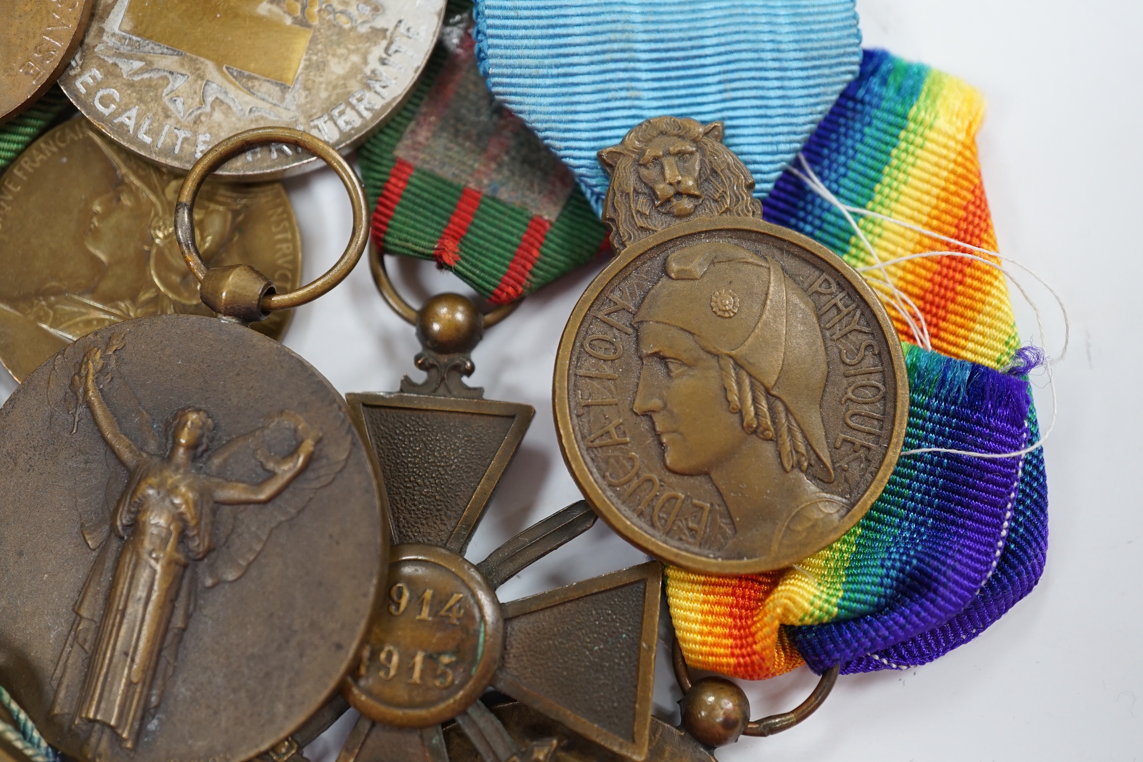 Eighteen French and Belgium medals, etc. including; Medal of Honour, War Cross, Medal of Honour for Physical Education, Victory Medal, etc.